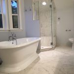 Rupp Family Builders Marble Glass Shower and Tub